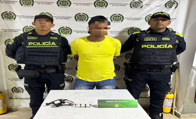 Policia y capturado