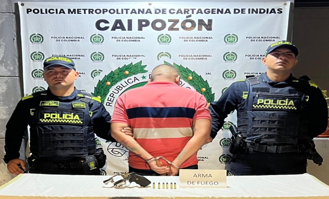 capturado con un arma de fuego