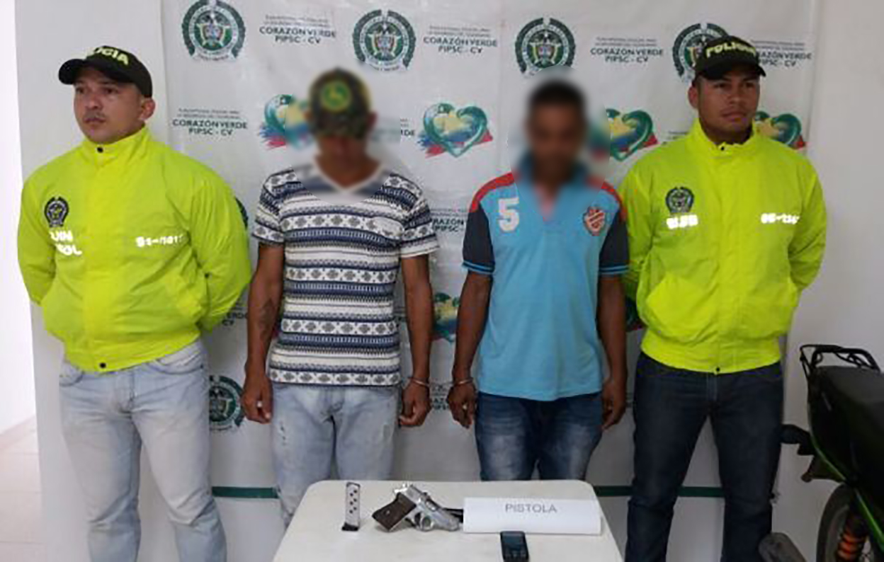 Capturados con arma de fuego y granada Capturados con arma de fuego y granada