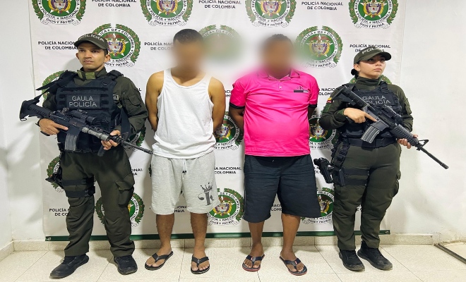 Dos Policías y Dos capturados